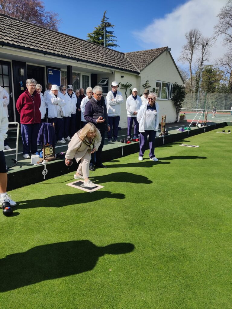 The Mayor, Helen Simpson, takes the first bowl of the 2026 season at the Hungerford Bowls Club Green Opening.